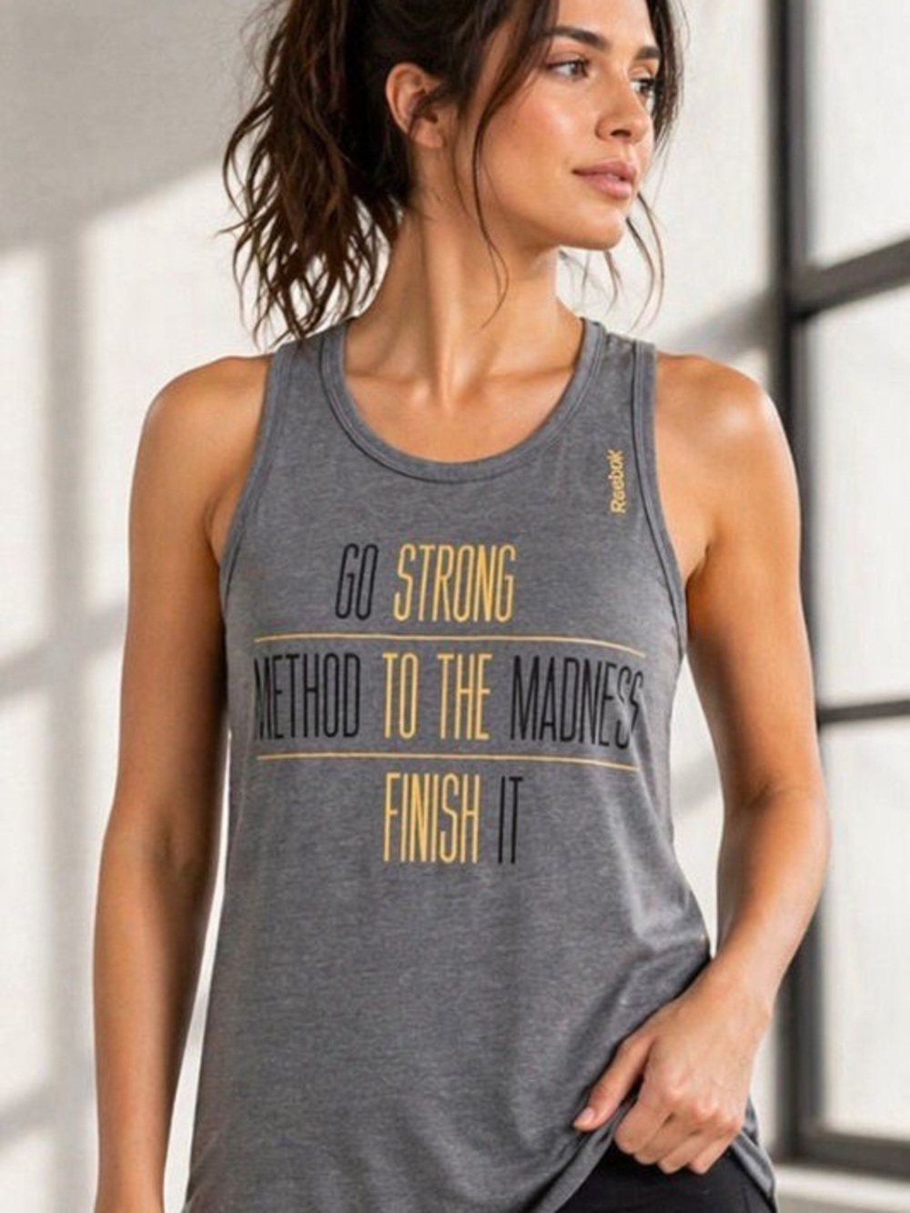 Reebok Women's Blue Tank Top with silver and Black Text